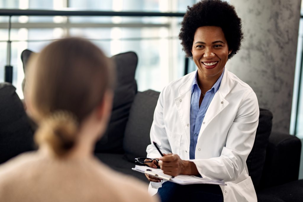 Clinician meeting with a prospective participant | Dane O'Leary Media